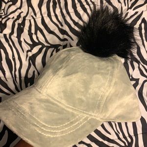 Suede hat with pompom